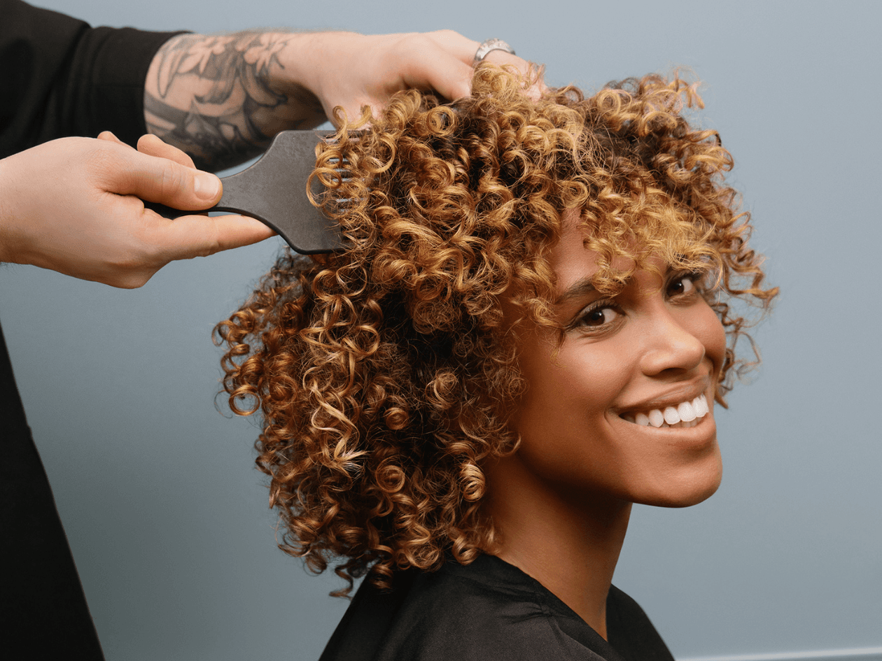 Coiffage cheveux bouclés